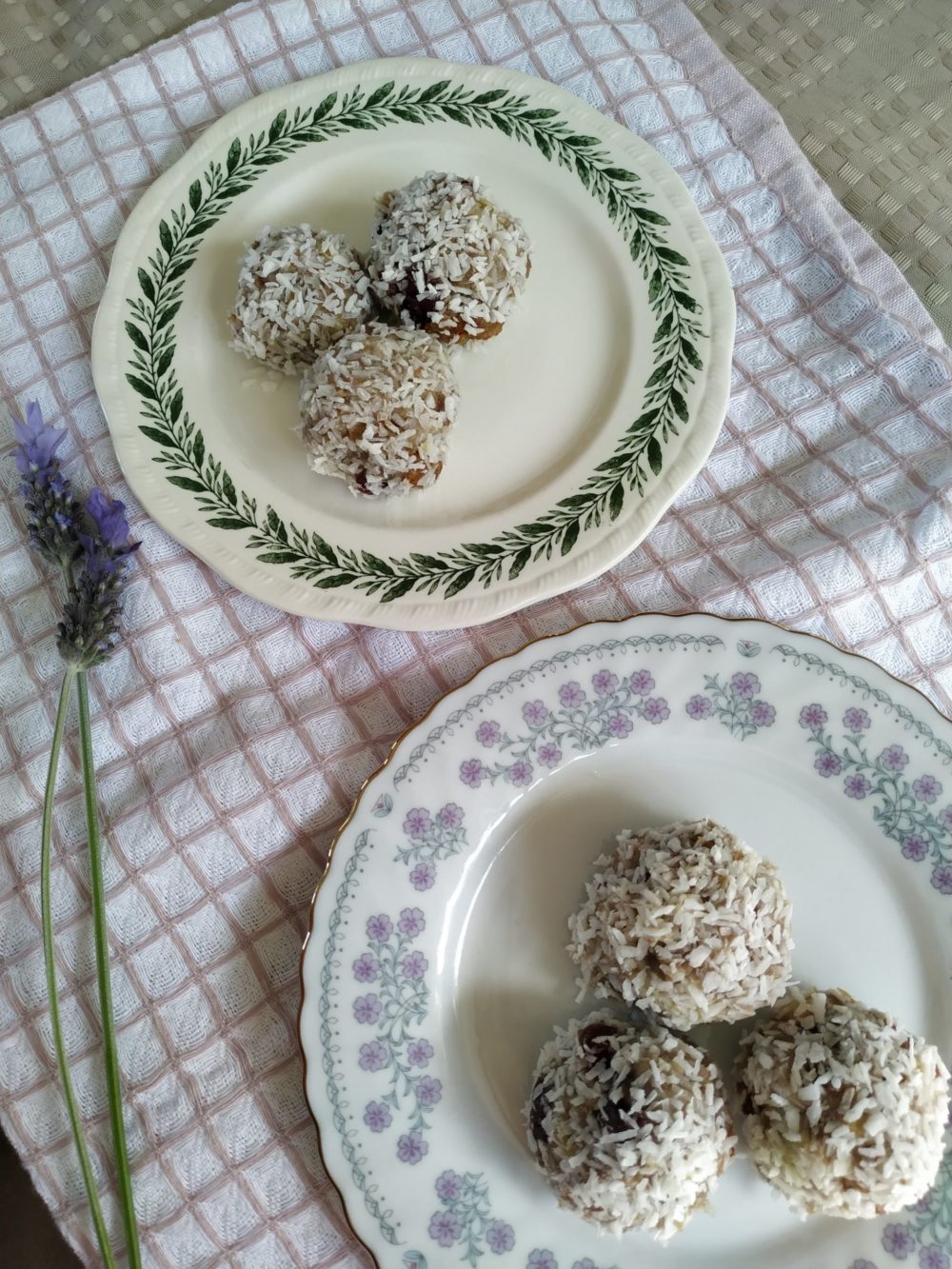 banana coconut energy balls on a floral plate