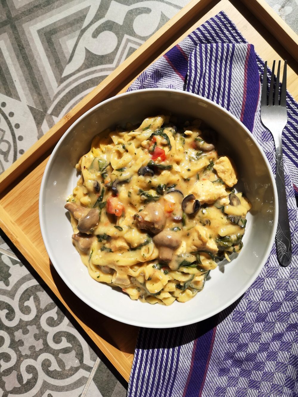 tofu mushroom florentine in a white bowl