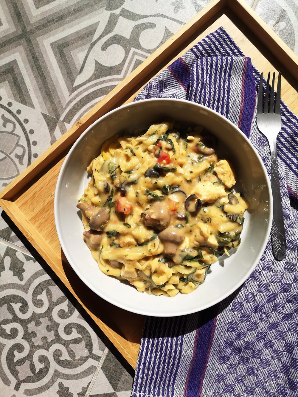 tofu mushroom florentine in a white bowl