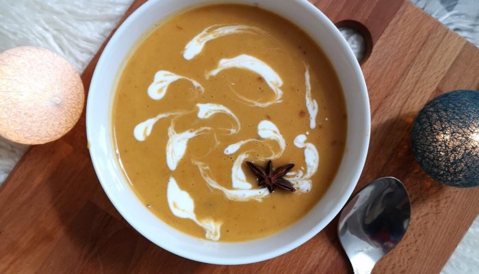 two bowls of vegan chai spiced butternut squash soup