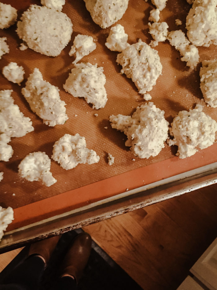 cauliflower bites on silicone sheet