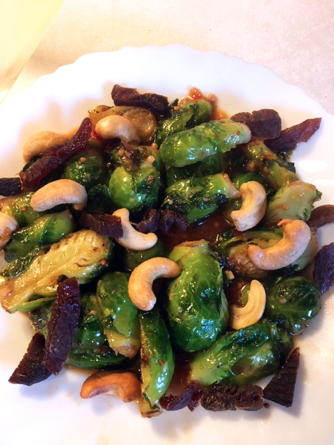 thai inspired brussels sprouts with dried apricots and cashews.