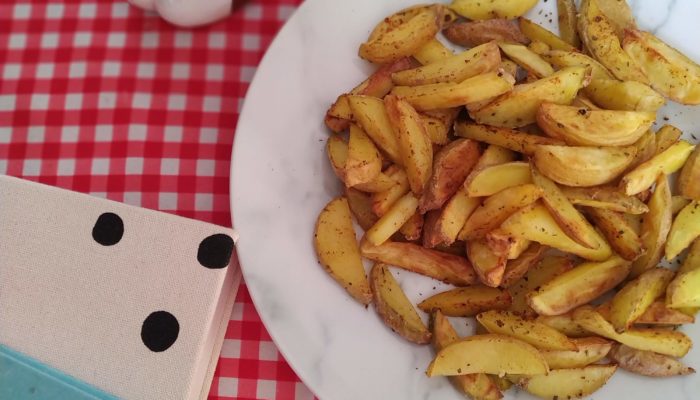 homemade vegan french fries on a picnic table