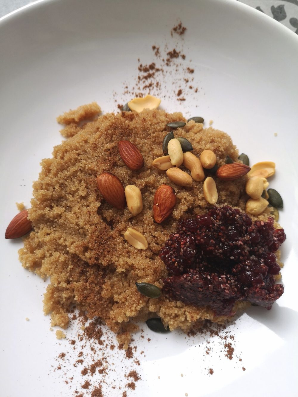 amaranth porridge on a white plate