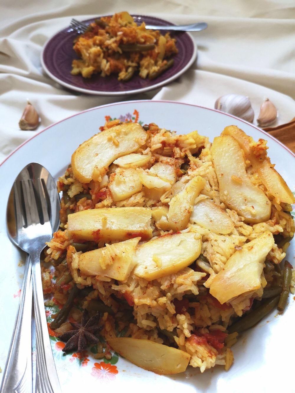 lubia polo on a plate with a spoon