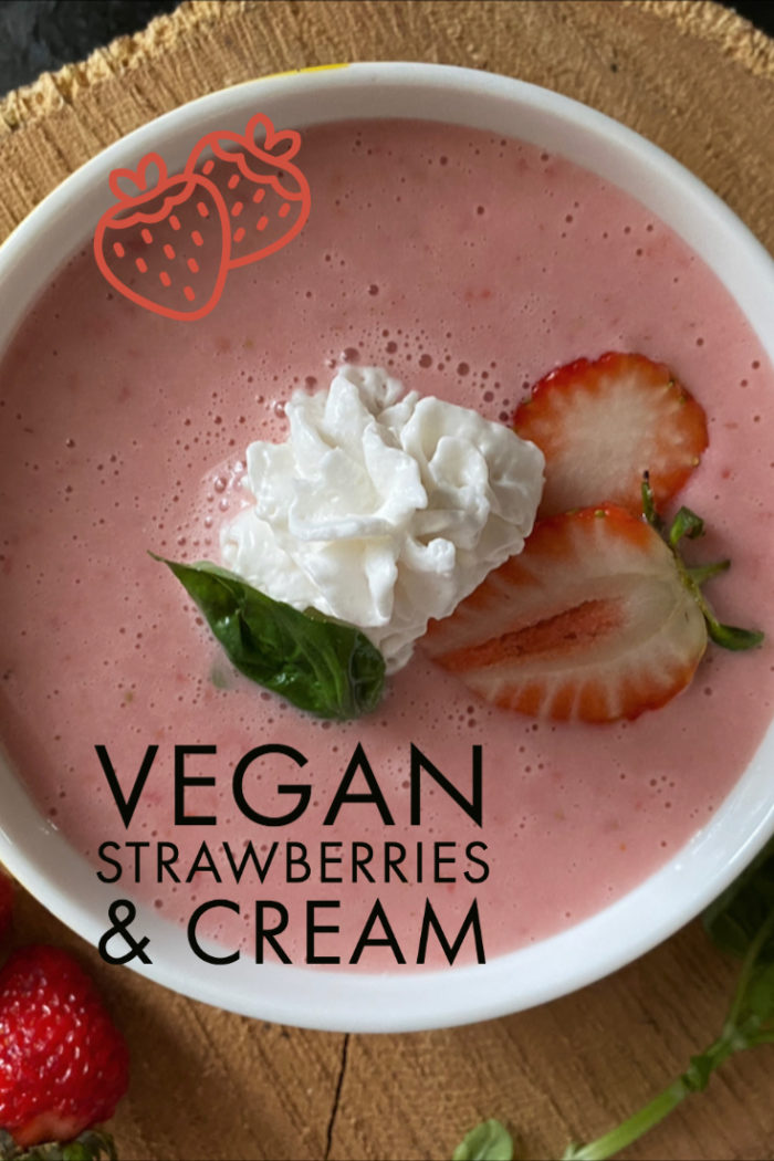 vegan strawberries and cream in a white bowl with caption