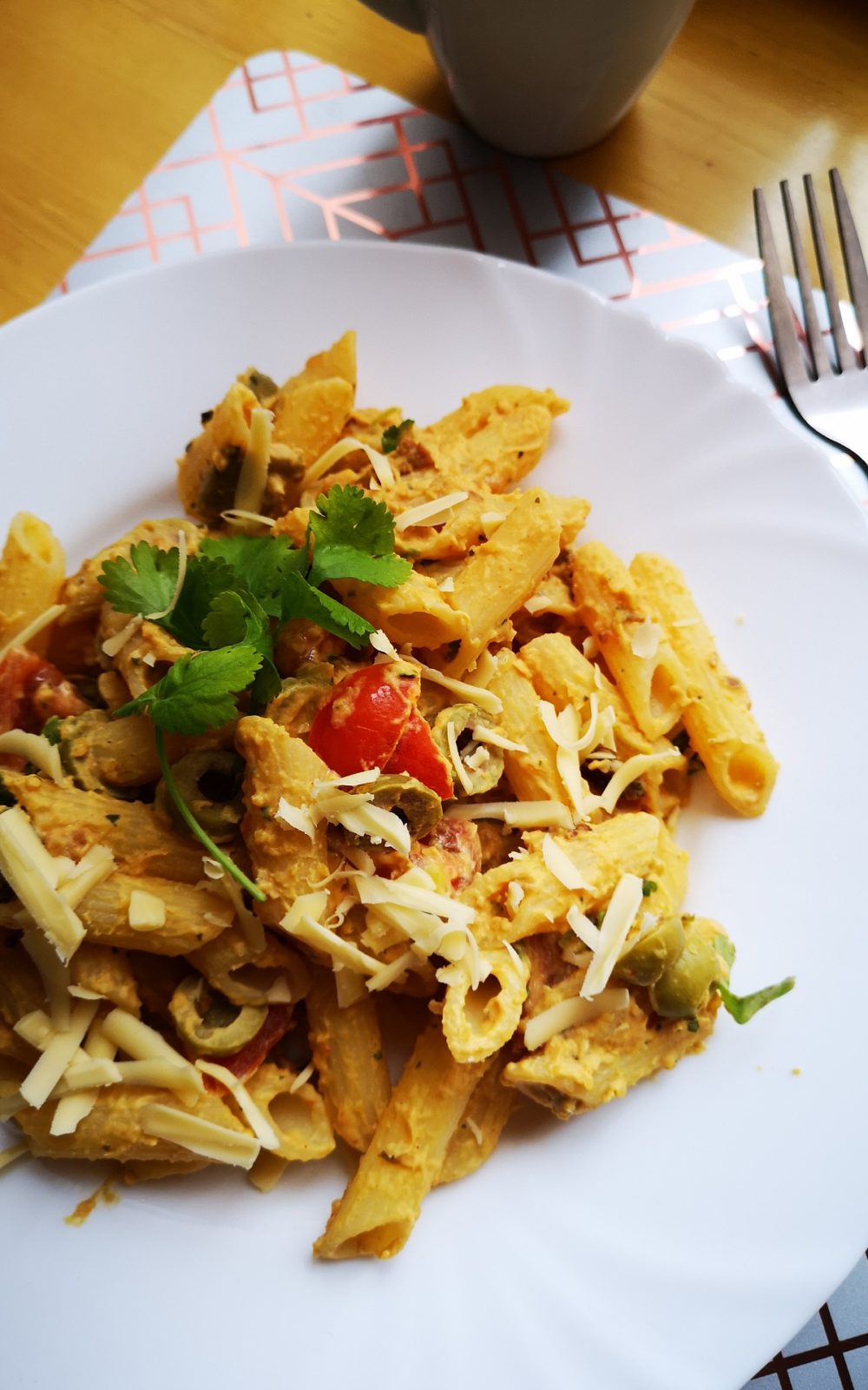 vegan moroccan hummus penne on a white plate