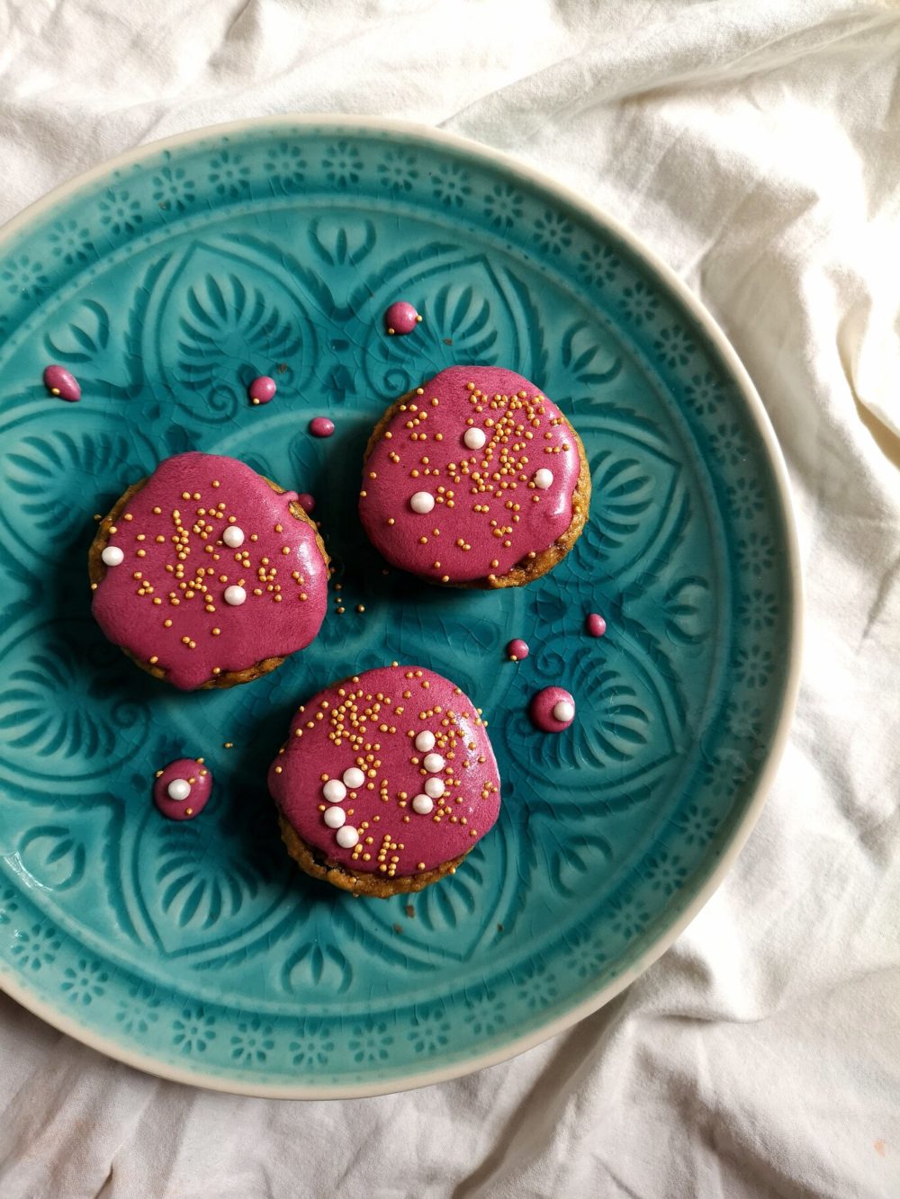 chickpea cupcakes on a teal plate