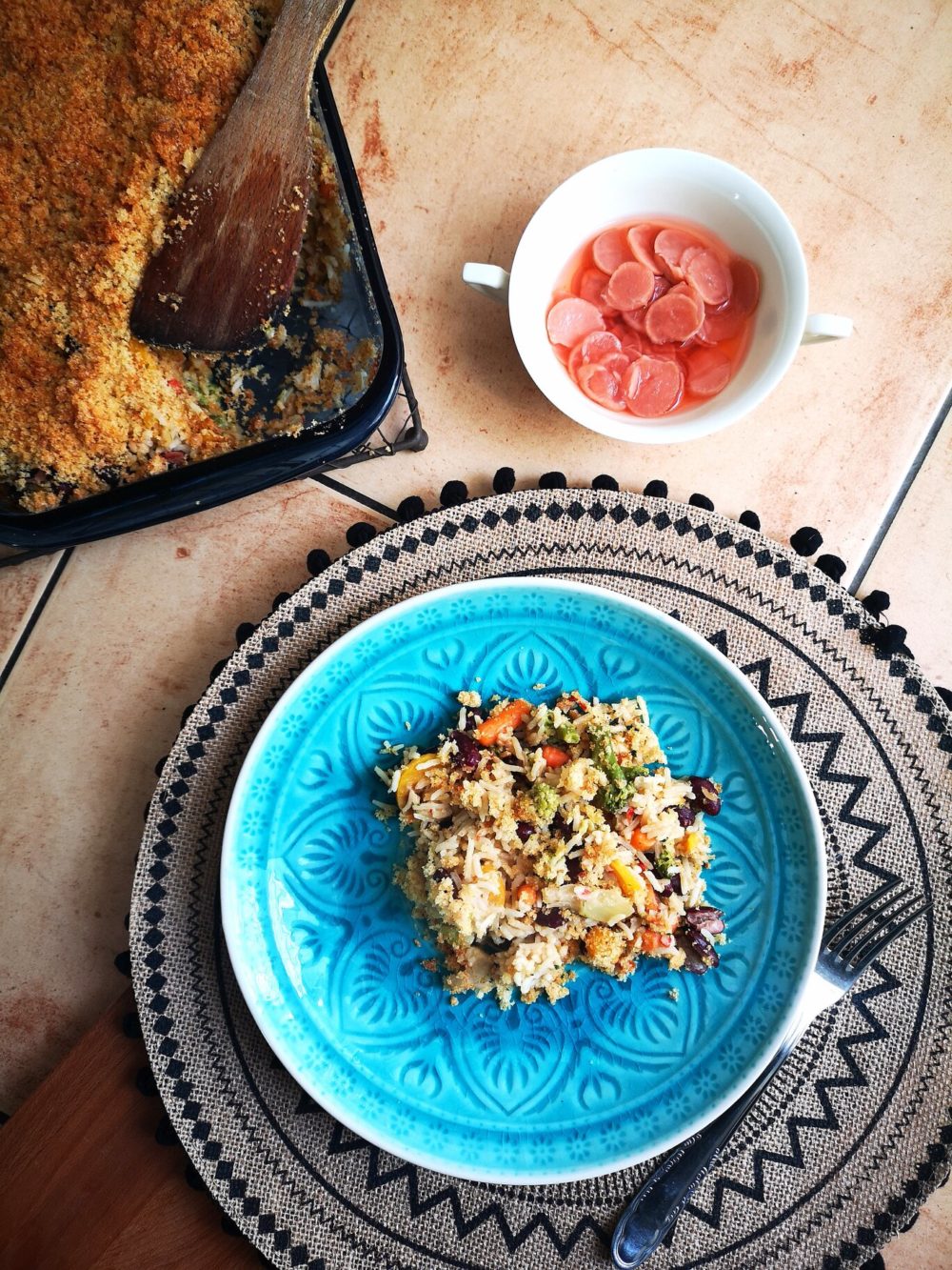 leftover casserole on a blue plate