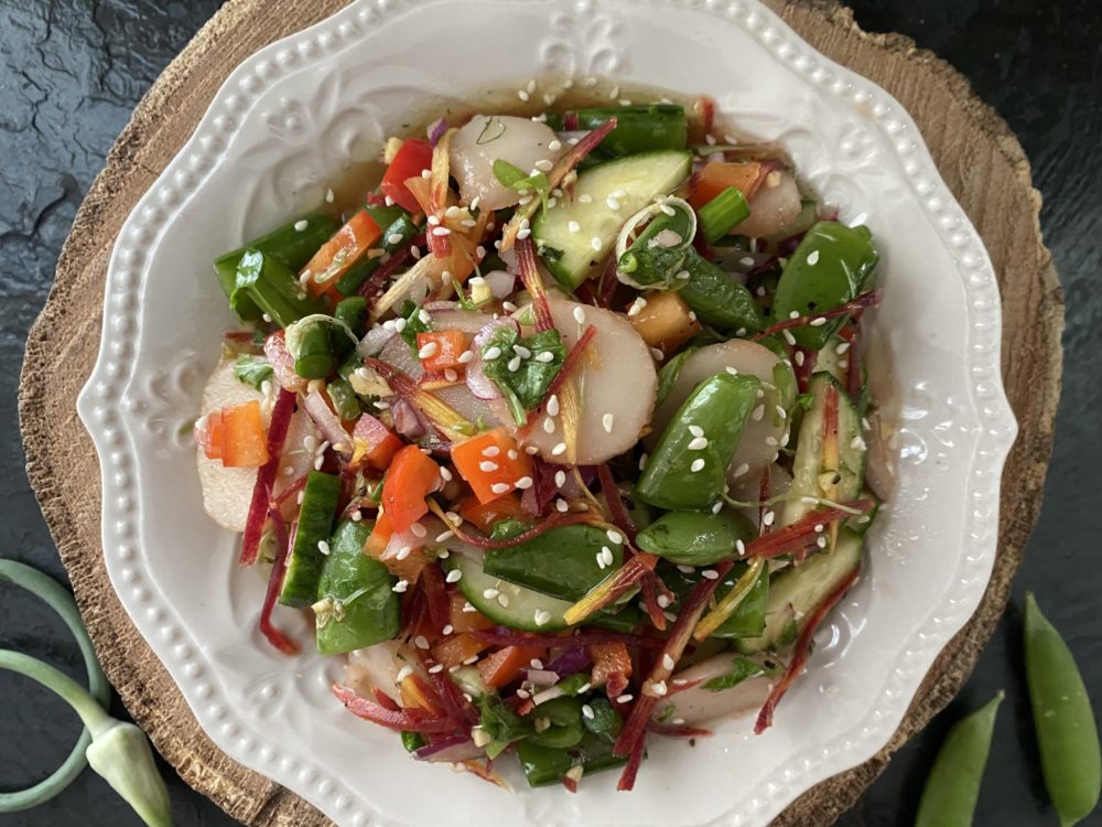 water chestnut salad on a white plate