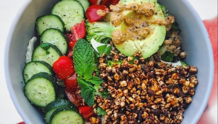 buckwheat salad in a blue bowl