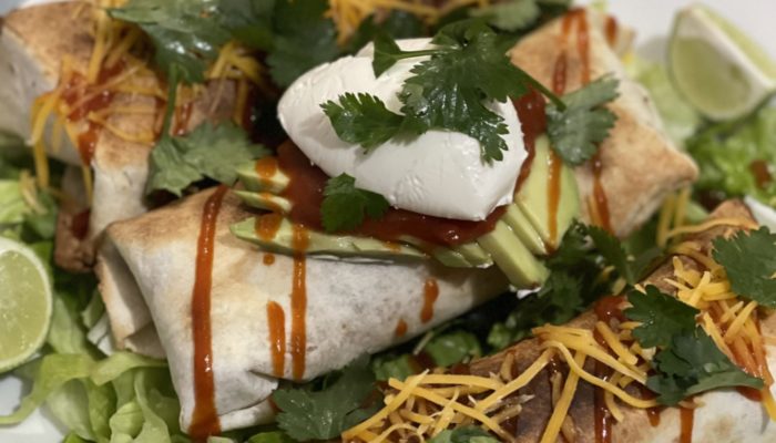 a plate of vegan chimichangas